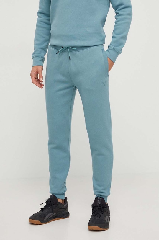 Guess spodnie dresowe ALDWIN dzianina turkusowy Z2YB22.K9V31