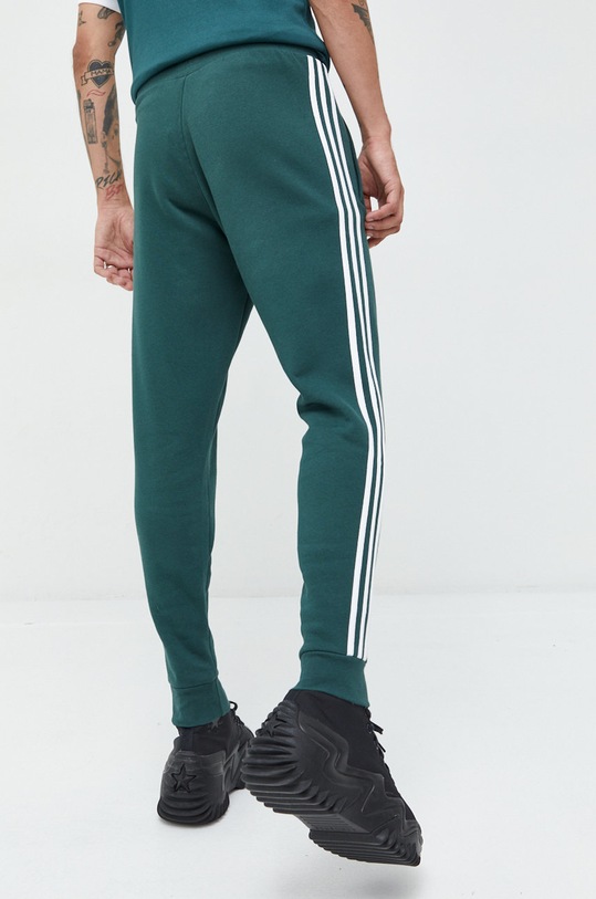 Odzież adidas Originals spodnie dresowe HK7299 zielony
