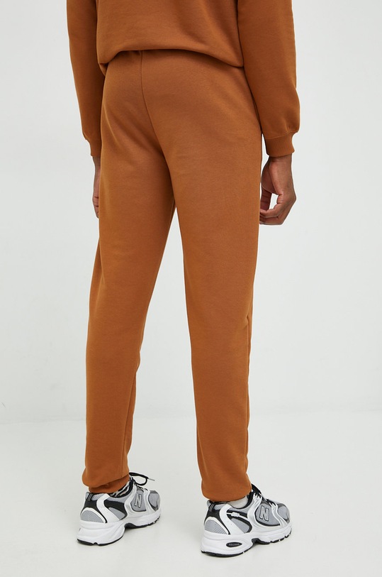 Odzież Fila spodnie dresowe FAM0160 brązowy