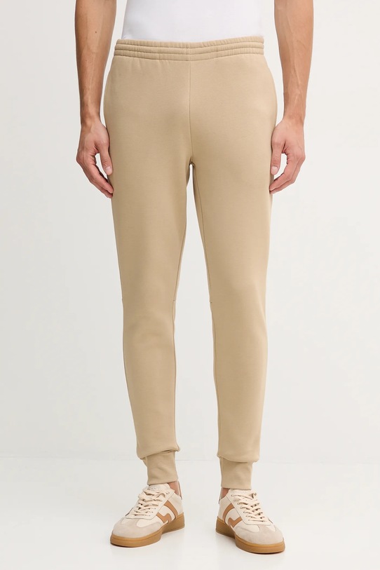 Lacoste spodnie dresowe dzianina beżowy XH9624