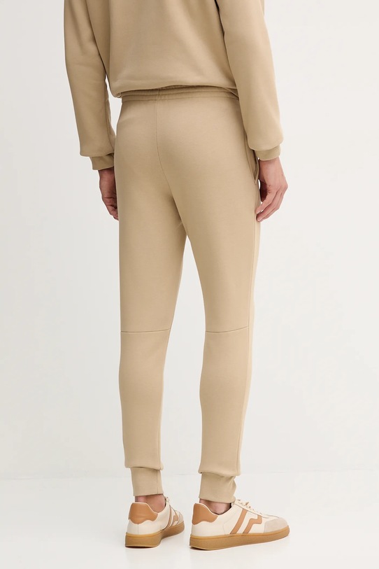Odzież Lacoste spodnie dresowe XH9624 beżowy