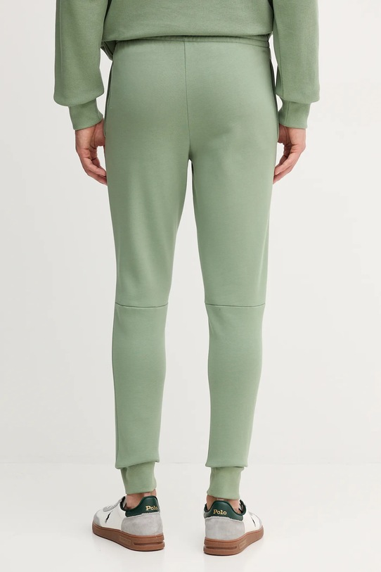 Odzież Lacoste spodnie dresowe XH9624 zielony