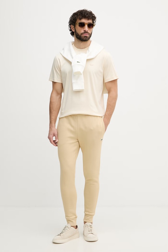 Lacoste spodnie dresowe z bawełną męskie XH9624 beżowy SS26