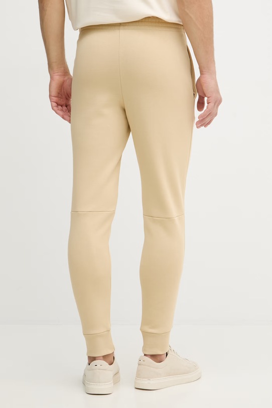 Odzież Lacoste spodnie dresowe z bawełną męskie XH9624 beżowy