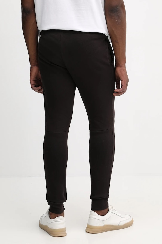 Odzież Lacoste spodnie dresowe XH9624 brązowy