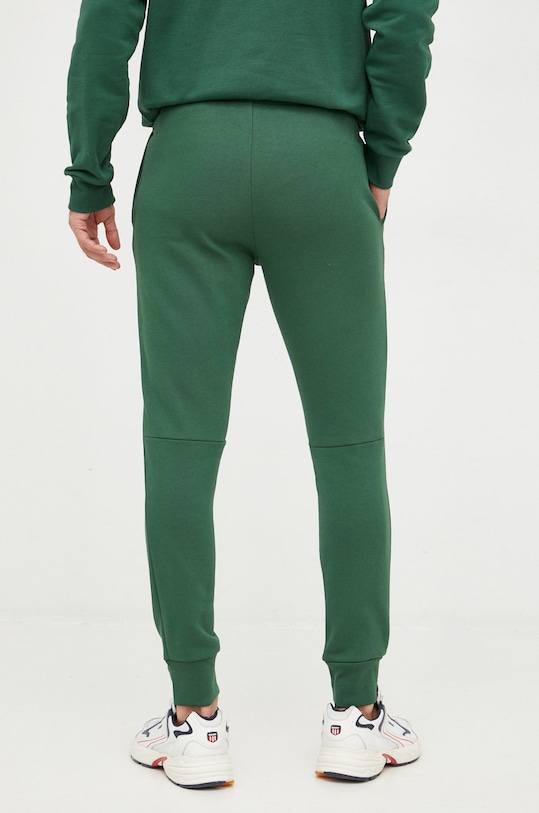 Odzież Lacoste spodnie dresowe XH9624 zielony