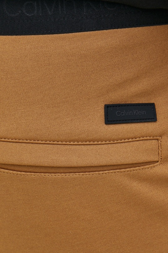 Calvin Klein spodnie brązowy K10K109913.9BYY