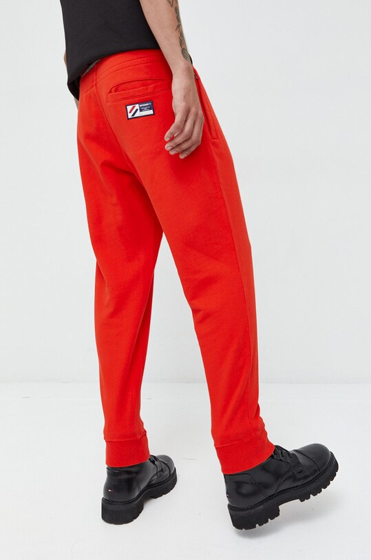 Odzież Superdry spodnie dresowe bawełniane M7010815A.60I czerwony