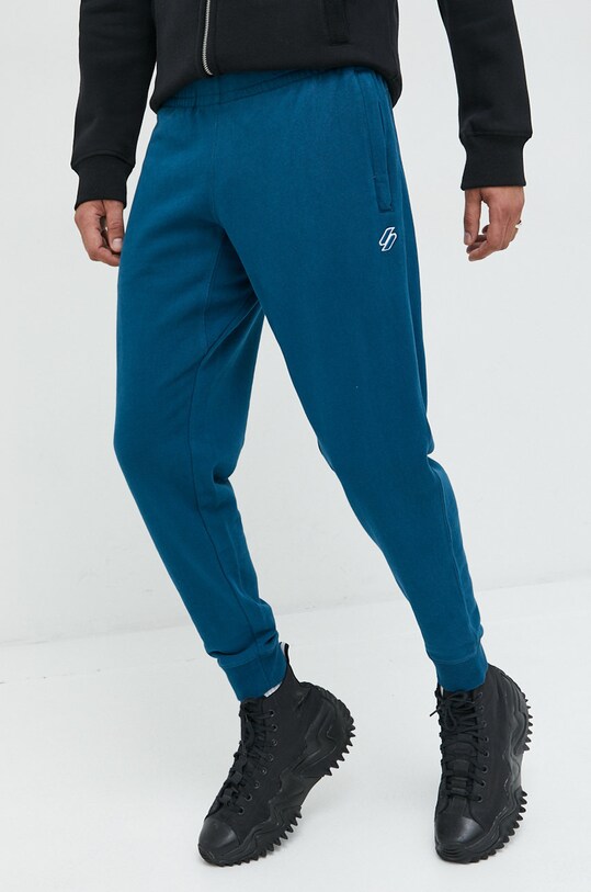 Superdry spodnie dresowe bawełniane bawełna niebieski M7010815A.BRO