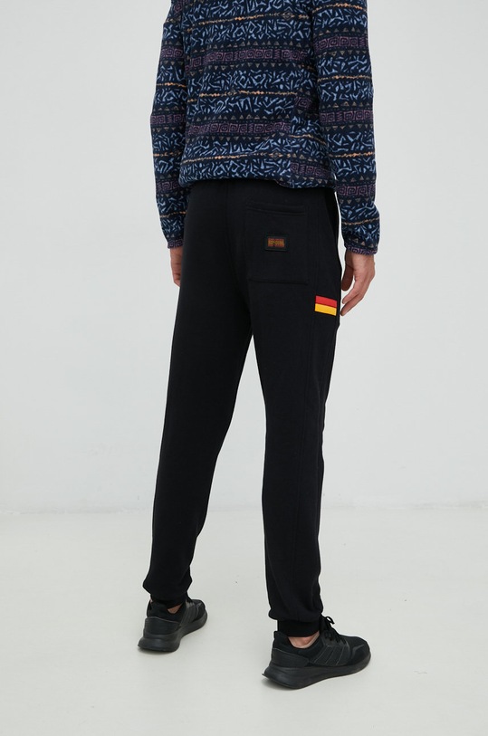 Oblačila Spodnji del trenirke Rip Curl Surf Revival 007MPA črna