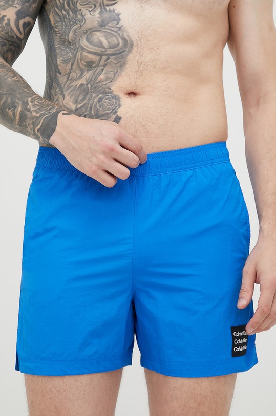 Plavkové šortky Calvin Klein Planet friendly modrá KM0KM00712.9BYY