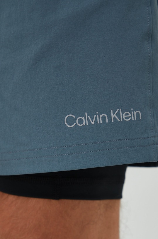 Tréninkové šortky Calvin Klein Performance Ck Essentials zelená 00GMF2S802.9BYY