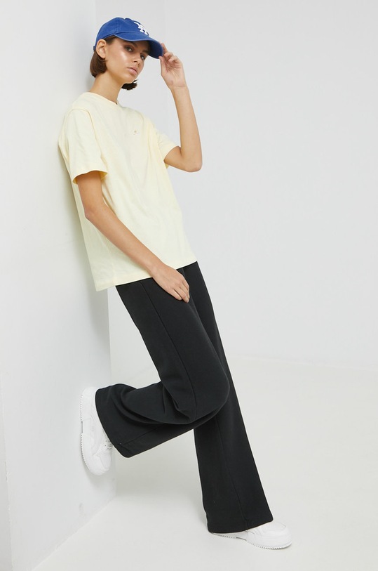 Bavlněné tričko Champion 115498 žlutá AW22