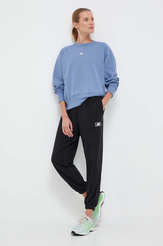 New Balance bluza bawełniana WT31500MYL niebieski AW23