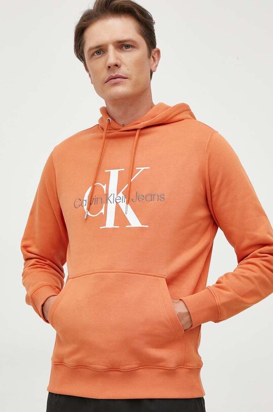 Бавовняна кофта Calvin Klein Jeans з капюшоном помаранчевий J30J320805