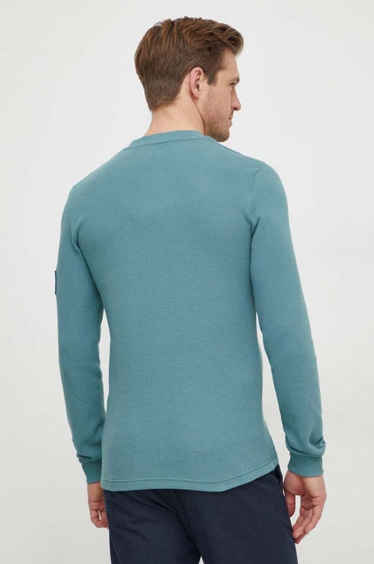 Odzież Calvin Klein Jeans bluza bawełniana J30J323485 turkusowy