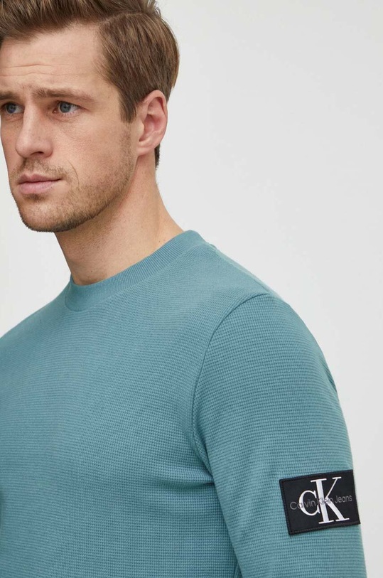 Calvin Klein Jeans bluza bawełniana turkusowy J30J323485