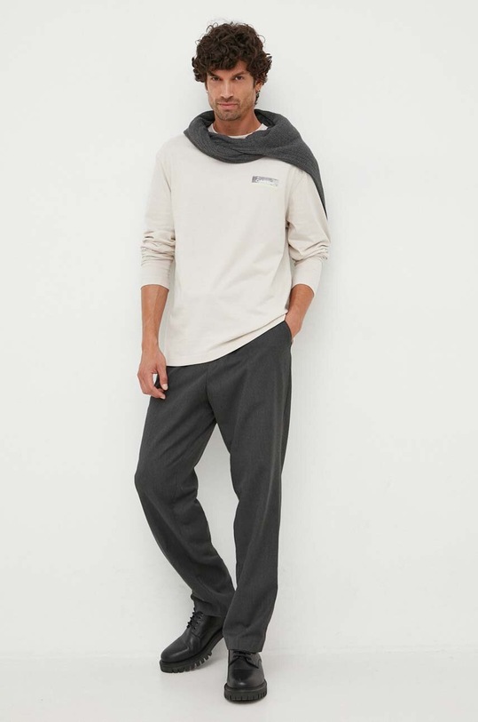 Бавовняний лонгслів Calvin Klein K10K111843 бежевий AW23