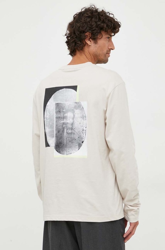 Одяг Бавовняний лонгслів Calvin Klein K10K111843 бежевий