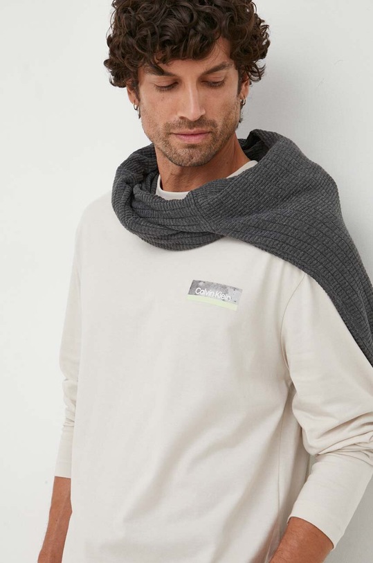 Бавовняний лонгслів Calvin Klein K10K111843 бежевий