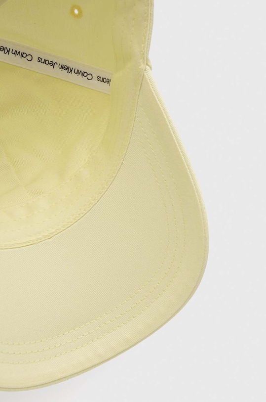 Bavlněná baseballová čepice Calvin Klein Jeans žlutá K60K610280