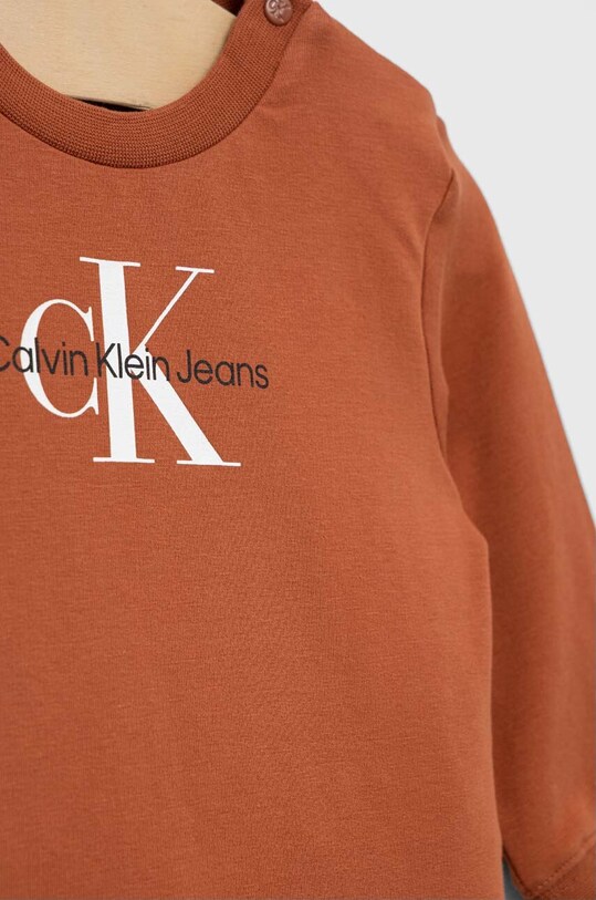 Дитячий спортивний костюм Calvin Klein Jeans помаранчевий IN0IN00017.9BYX