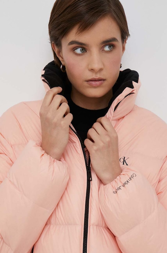 Páperová bunda Calvin Klein Jeans oranžová J20J221649