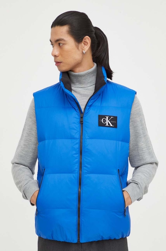 Páperová vesta Calvin Klein Jeans zateplené modrá J30J323473