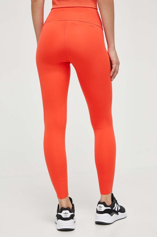 Odzież adidas Performance legginsy treningowe Optime Power IL1792 pomarańczowy