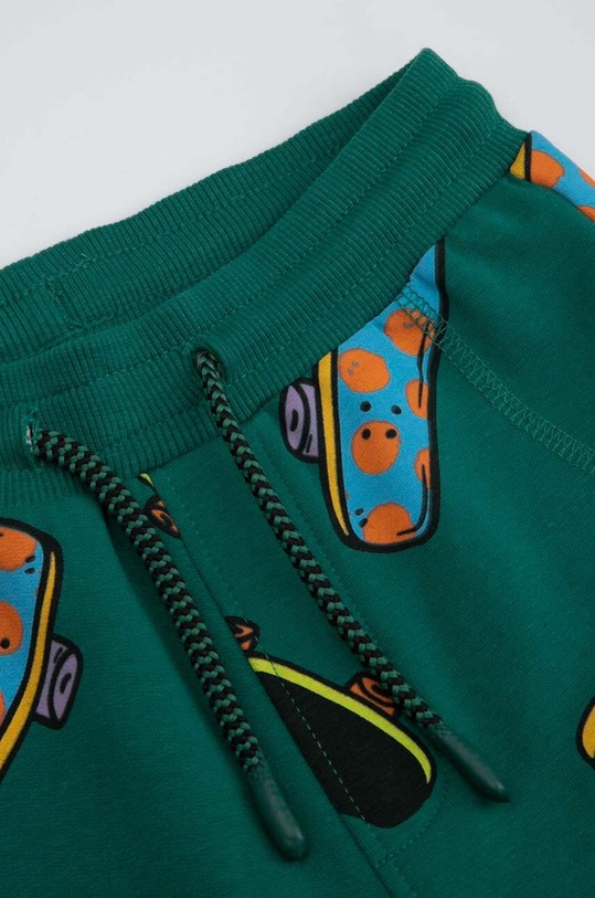 Dětské tepláky Coccodrillo zelená ZC3122701ASK