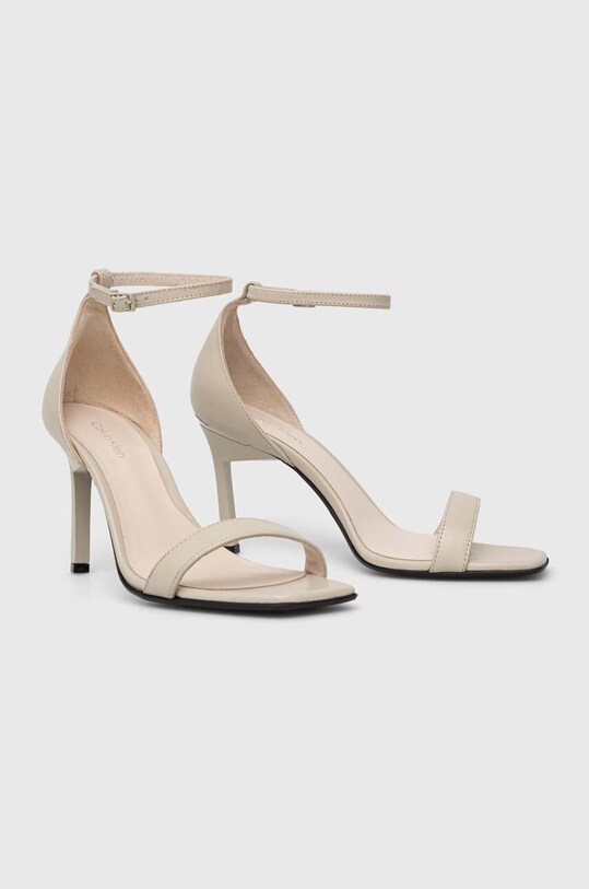 Δερμάτινα σανδάλια Calvin Klein GEO STILETTO SANDAL HW0HW01610 μπεζ AW23