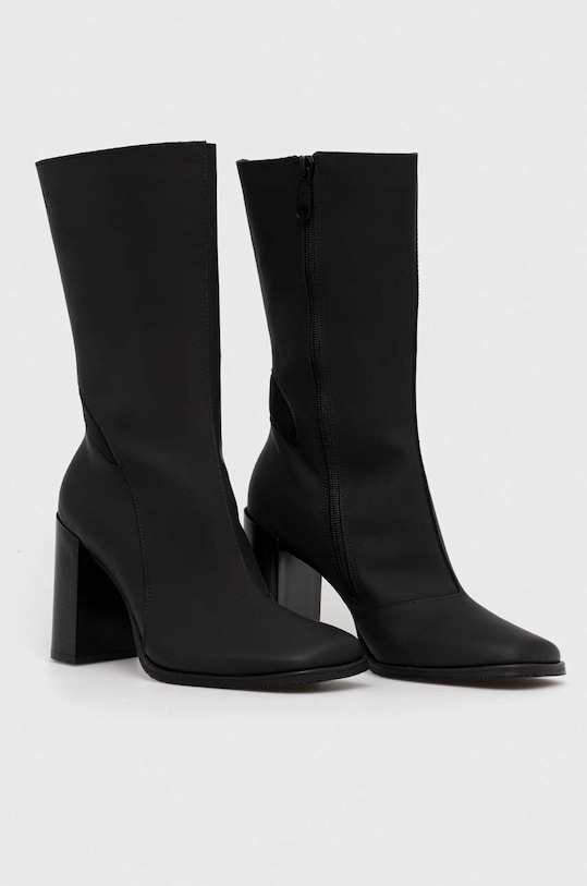 Kožne gležnjače Calvin Klein Jeans HEEL ZIP BOOT LTH WN YW0YW01113 crna AW23