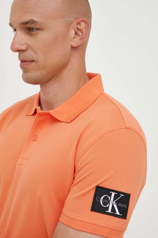 Bavlnené polo tričko Calvin Klein Jeans oranžová J30J323394