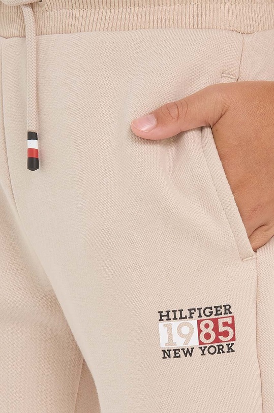Detské tepláky Tommy Hilfiger KB0KB08475.128.176.9BYX béžová