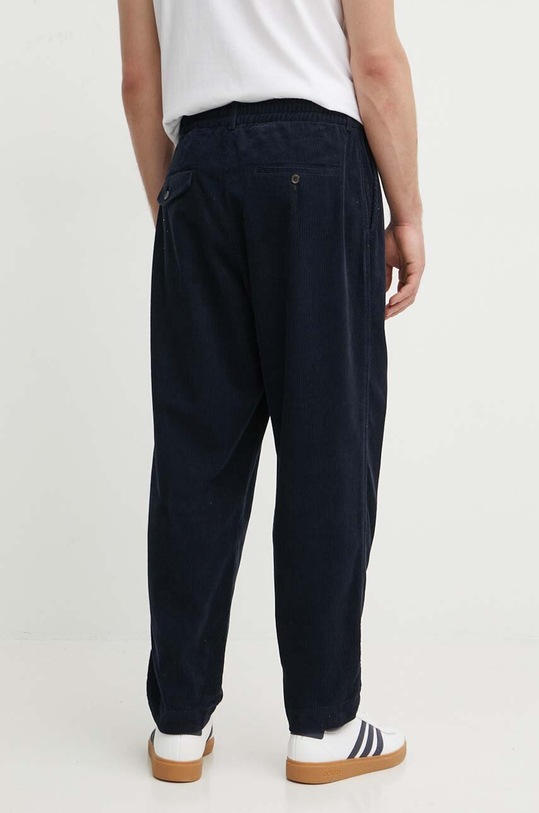 Odzież Universal Works spodnie sztruksowe PLEATED TRACK PANT 29519 granatowy
