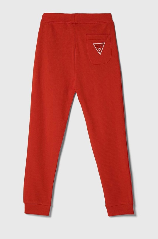 Guess spodnie dresowe bawełniane dziecięce L93Q24.KAUG0.9BYX czerwony AW23