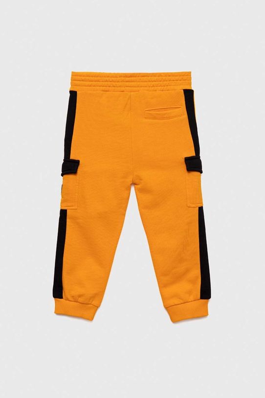 Detské bavlnené tepláky Guess N3YQ12.KA6R3.9BYX oranžová AW23