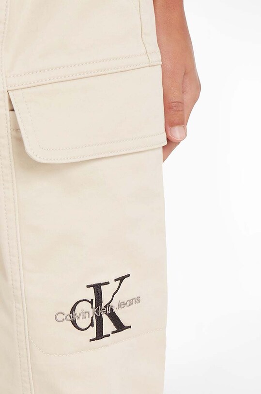 Детские брюки Calvin Klein Jeans IB0IB01675.9BYX бежевый