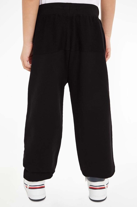 Detské bavlnené tepláky Calvin Klein Jeans IB0IB01677.9BYX