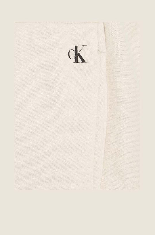 Calvin Klein Jeans spodnie dresowe dziecięce beżowy IB0IB01681.9BYX