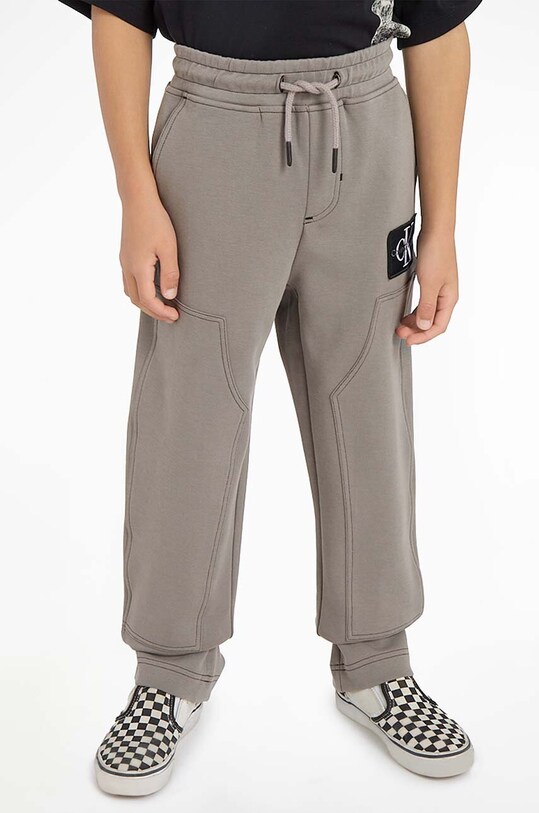 Дитячі спортивні штани Calvin Klein Jeans з еластаном сірий IB0IB01769.9BYX