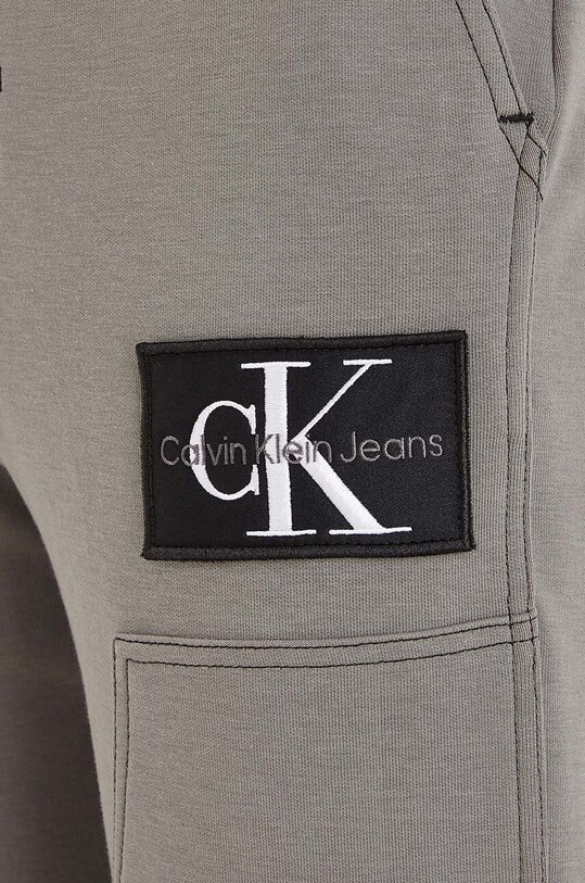 Calvin Klein Jeans spodnie dresowe dziecięce szary IB0IB01769.9BYX