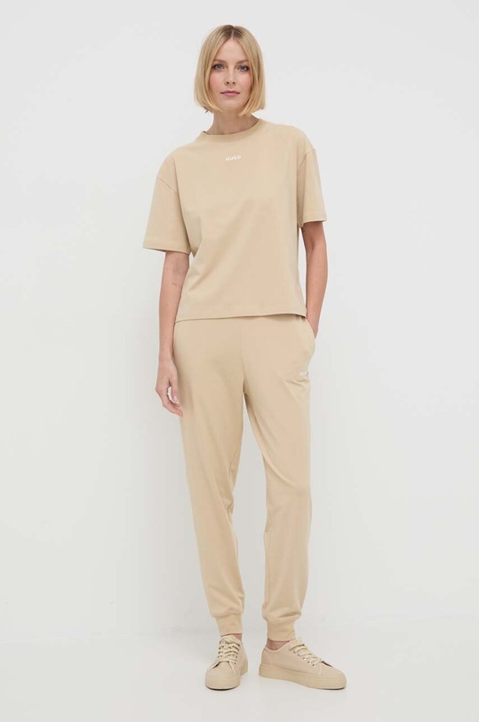 HUGO spodnie lounge 50490578 beżowy AW25