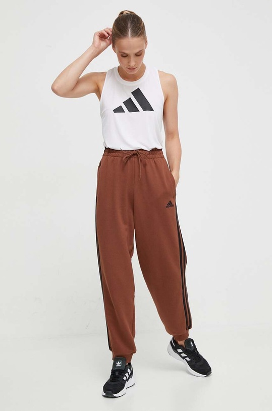 adidas spodnie dresowe bawełniane IL3451 brązowy AW23
