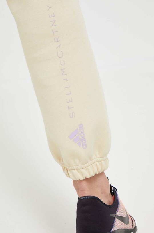Παντελόνι φόρμας adidas by Stella McCartney κίτρινο IJ0574