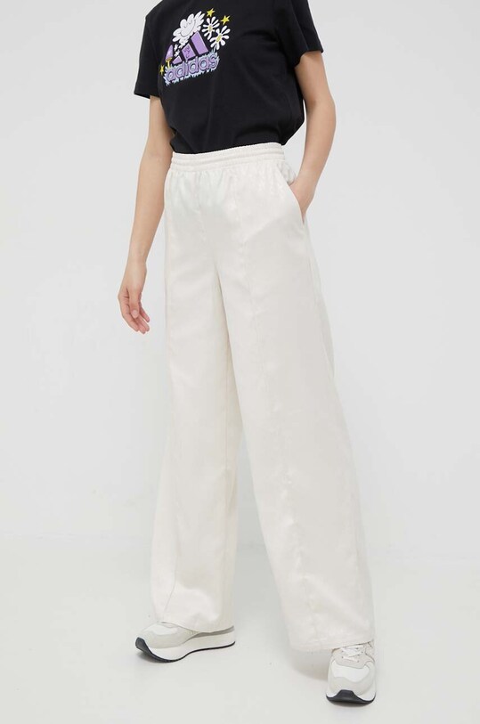 Штани adidas Originals дрібний узор бежевий IJ7084