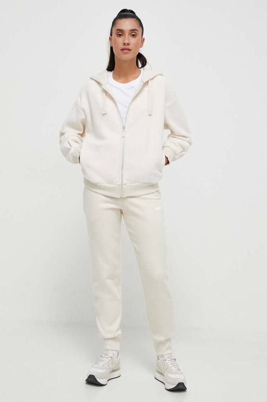 Puma spodnie dresowe 586841 beżowy AW24