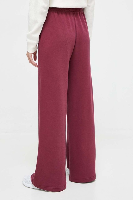 Odzież Puma spodnie dresowe 621411 bordowy