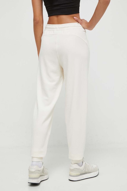 Îmbrăcăminte Puma pantaloni de trening 676069 bej