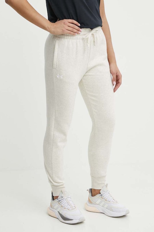 Under Armour spodnie dresowe dzianina beżowy 1379438